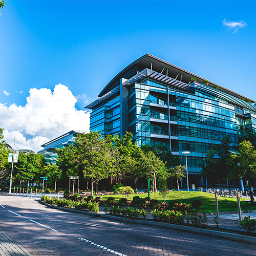 Commercial building with blue skies and landscaping